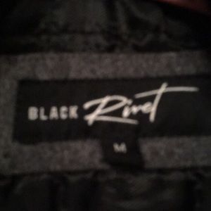 Black rivet men’s jacket.
